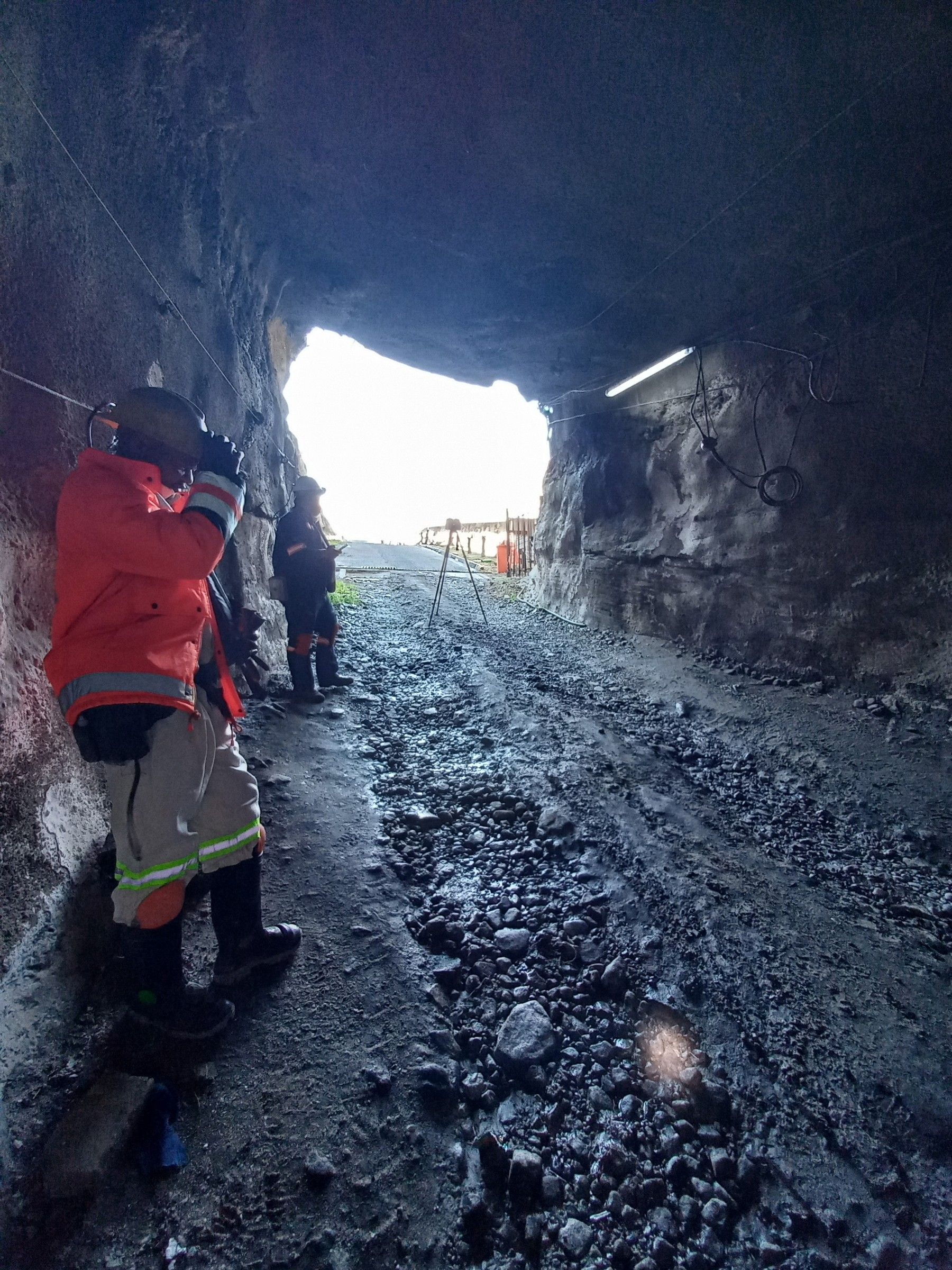 Surveyors at the portal of an underground working